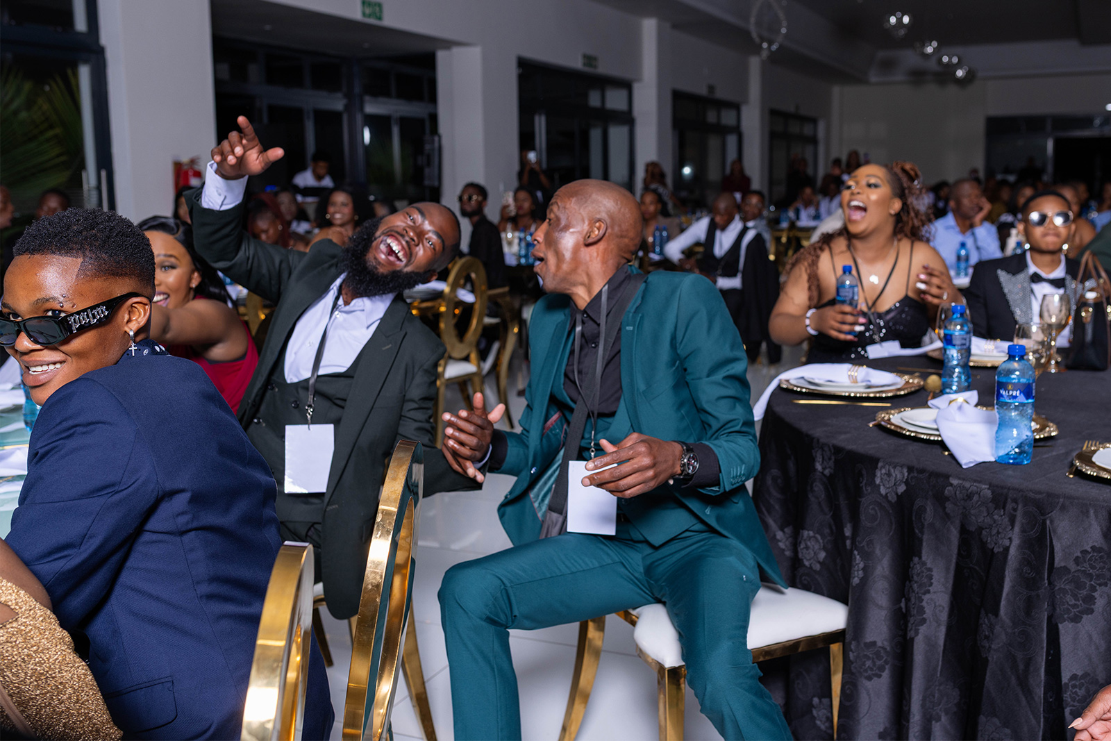 Executive guests in conversation during a premium corporate event photographed by IyanaT Production